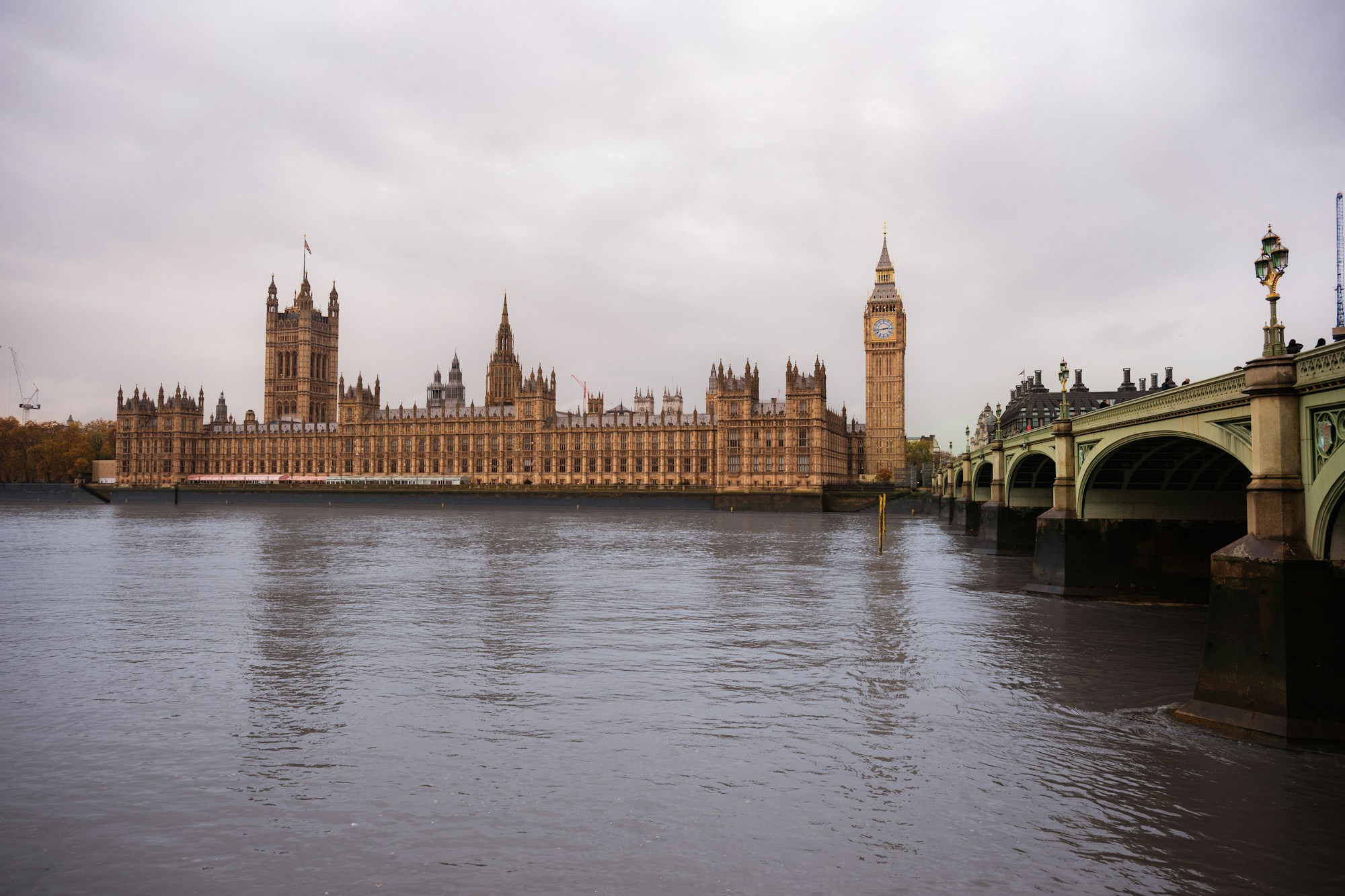 A calm view of Westminster and the River Thames, London